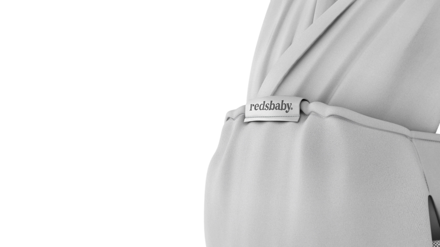 Folded Redsbaby CONNECT Wrap South Africa in self-stowing storage pocket”