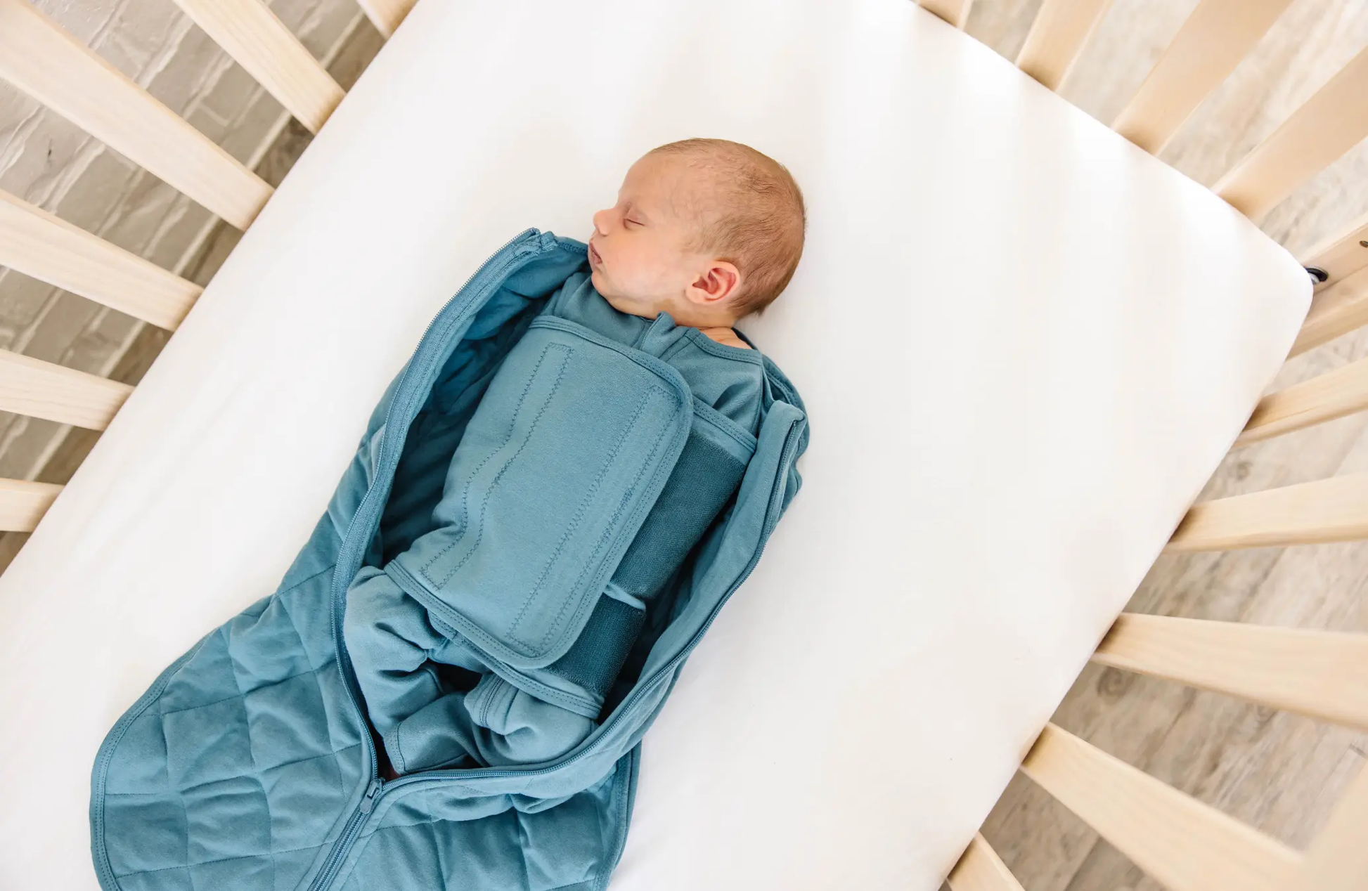 Dreamland Baby Weighted Sleep Swaddle 0-6 Months (S+) - Motherhood