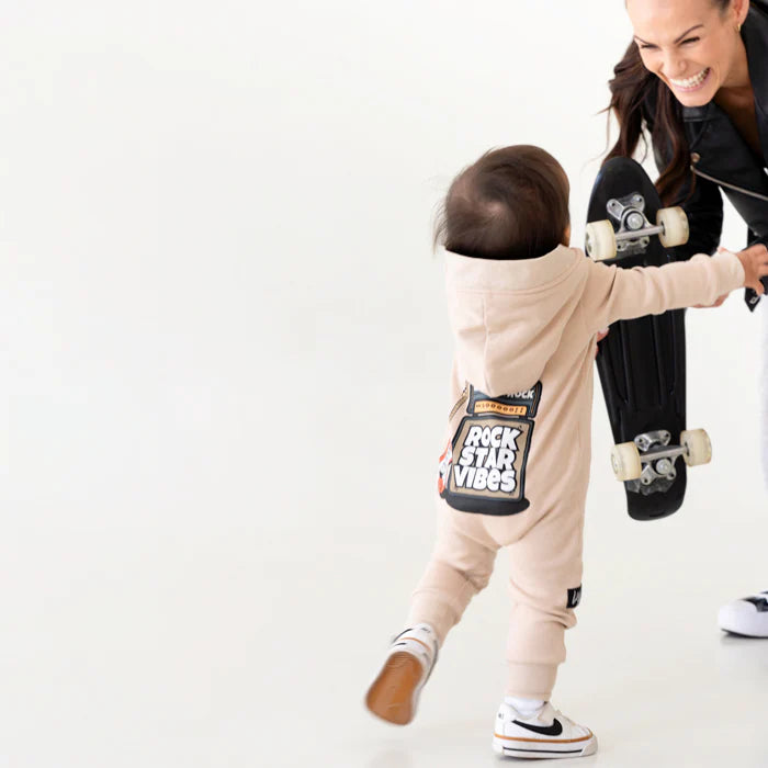 Lullaby Rock Rockstar Vibes Zip-Up Onesie in Tan – Hooded Fleece Onesie - Motherhood